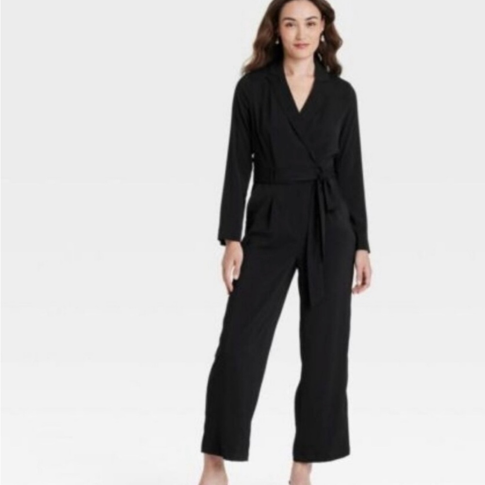a new day Black Wrap Jumpsuit some of them don’t have Tags but they are new.